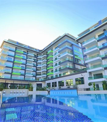 Own Citizenship,100m From The Beach Opportunity, A Luxury Three-Bedroom Apartment For Sale in Alanya